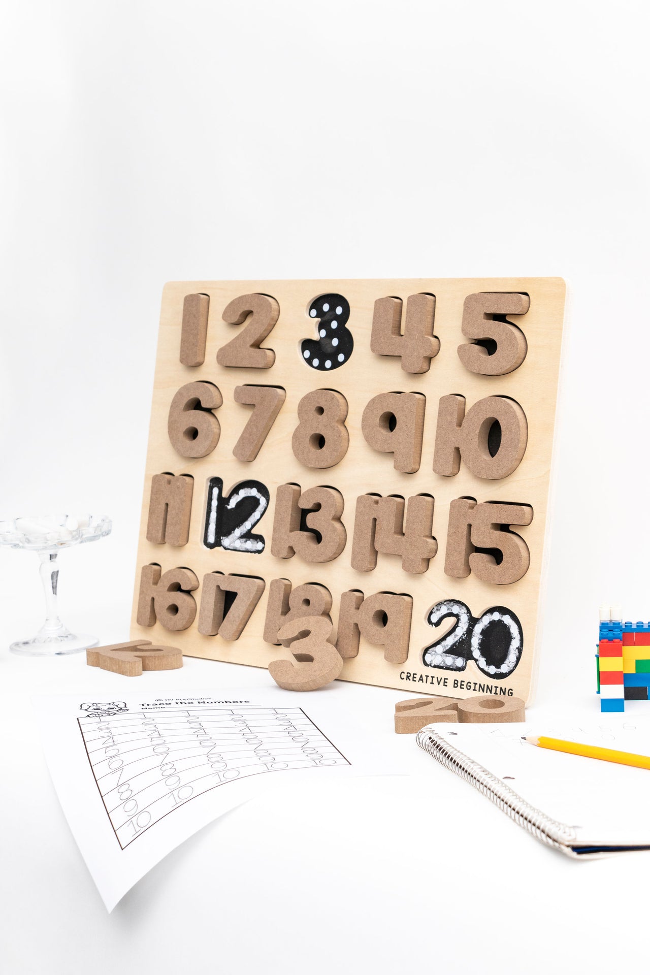 Educational number puzzle set with tactile numbers 0-9 and quantity representations